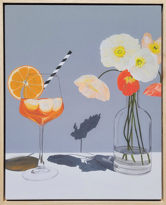 framed art of flowers and aperol